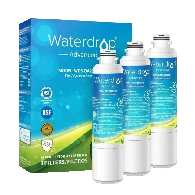 A refrigerator water dispenser filling a glass, with a replacement filter cartridge beside it.