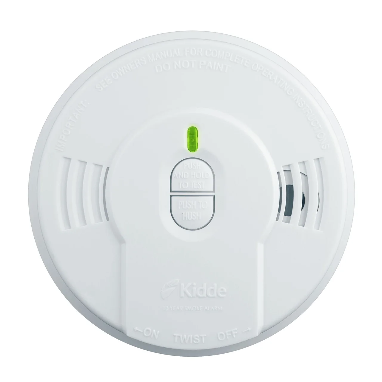 A white smoke detector mounted on a hallway ceiling.